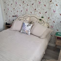Upholstered bed with mattress