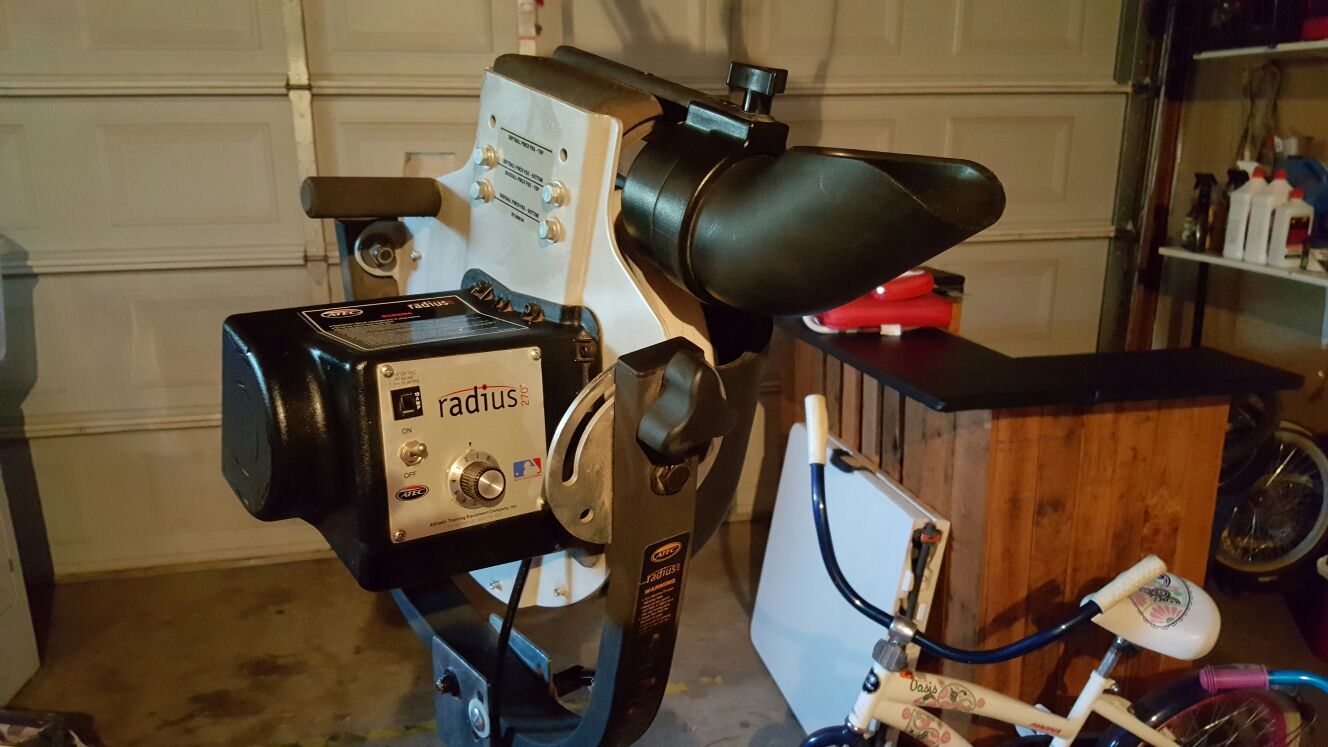 Atec Radius 270 Baseball Softball Pitching Machine. Only used about a hand full of times comes with Softball attachment will pitch at 70 miles/hour