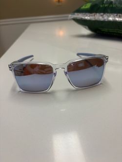 Oakley sunglasses- clear frame baby blue prizm lenses with protection plan