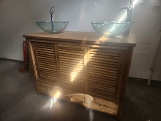 Bathroom vanity w/ glass vessel sinks & chrome faucets