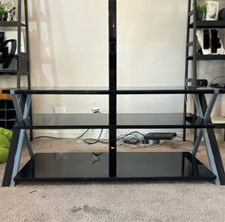 Entertainment center with bar to make tv float