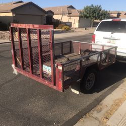 All metal 4x8 trailer with drop gate And Wood Floors Serious Only!!!