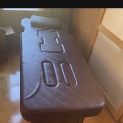 Massage table