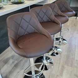 Modern design adjustable bar stools/ barstools in box only  $75 each.