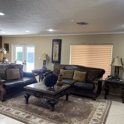 Living Room,wall unit,pictures,light fixture,couch,console,breakfast table