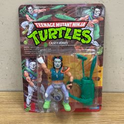 1989 PLAYMATES TEENAGE MUTANT NINJA TURTLES CASEY JONES THE BATTERING VIGILANTE SPORTSMAN.