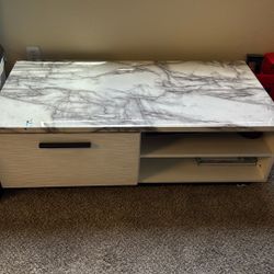 Coffee Table With A Granted Top