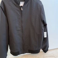 Brand new with tags mens black jacket with tags. size medium. retails for $7”