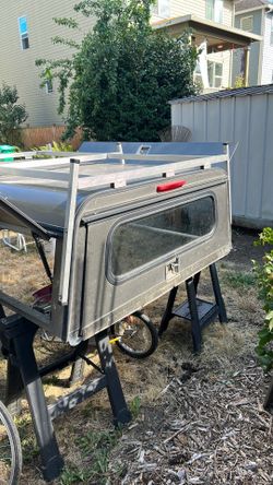 Contractor rack and canopy with opening and locking side panels