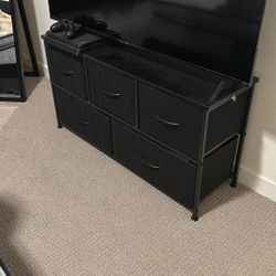 Black dresser and black nightstand