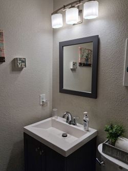 Bathroom vanity w/ lights, mirror, faucet