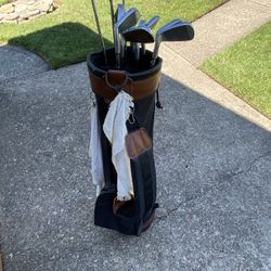 Men’s golf clubs with bag and balls