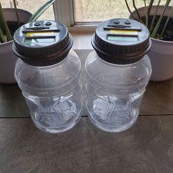 Digital Coin Counting Jar by Sharper Image is an original plastic coin counting bank with a digital display lid