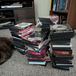 2 Dvd Players And About 100 Dvds