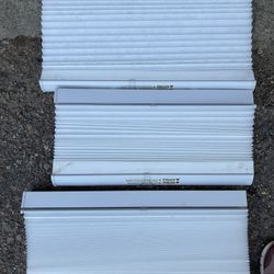 White accordion blinds assorted sizes
