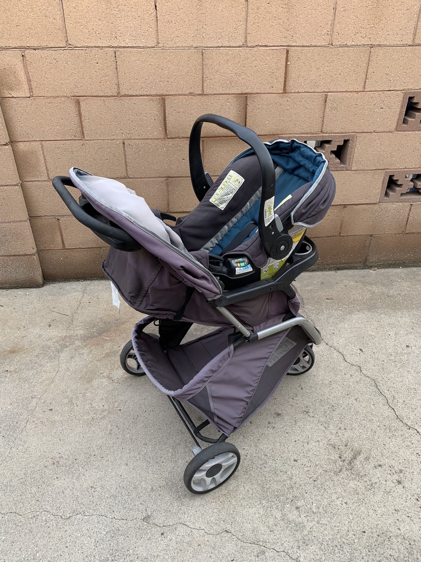 Car seat + stroller and 2 bases. Great as a dog carrier too!