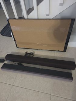 Tv and 2 Soundbar with remotes