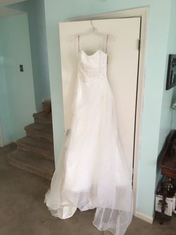 Wedding dress ( never worn)