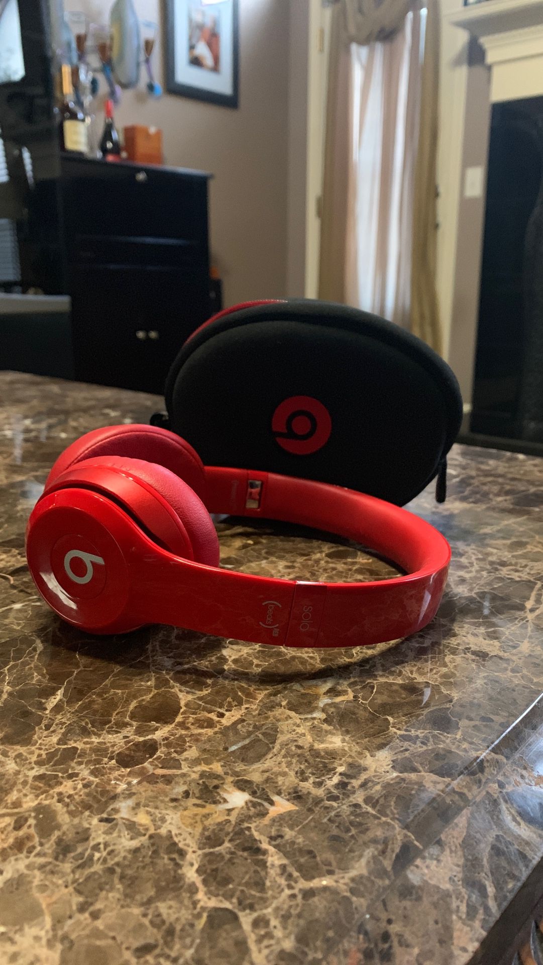 Beats by Dre headphones red