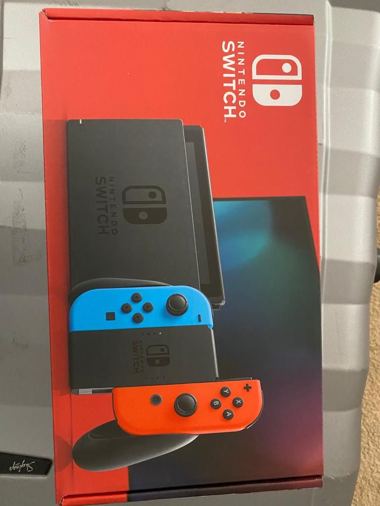 Nintendo Switch With Neon Blue And Red Joy-con