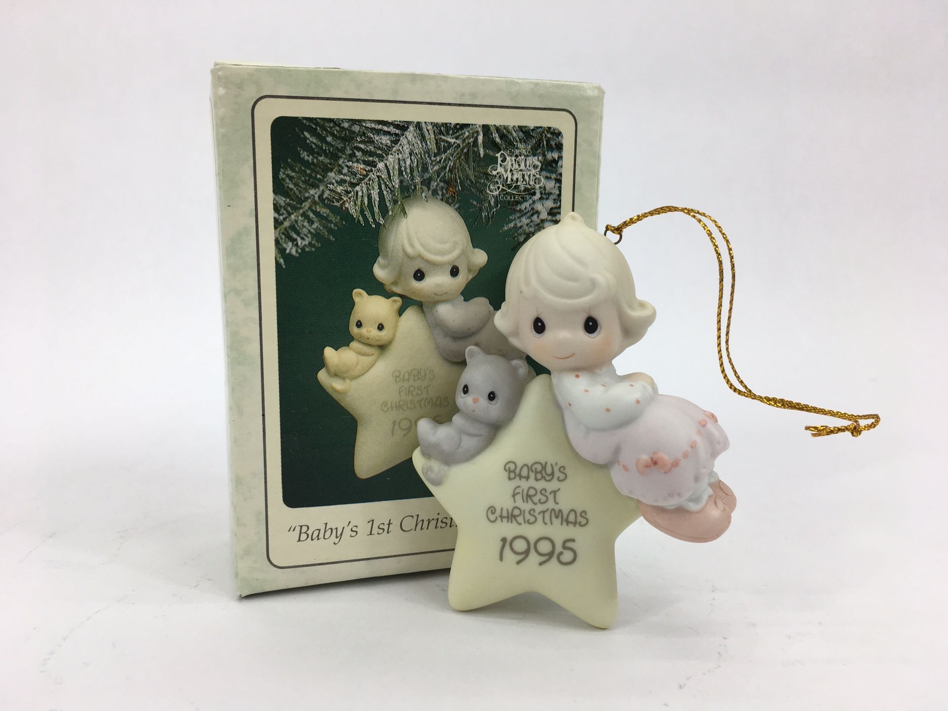 Enesco Precious Moments “Baby’s First Christmas” Ornament (1995)