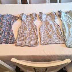 6 total: wearable blankets with swaddle wrap, zipadee zip swaddle transition & transition swaddles. Great condition. 
