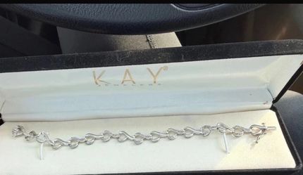 Natural Diamond tennis bracelet by Kay Jewelers set in Sterling 925 solid silver hearts infinity bracelet