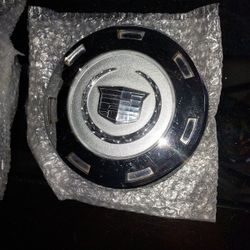 Aftermarket 22-inch chrome wheel center cap  Cadillac Escalade. 