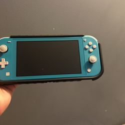 Nintendo Switch Light Blue With Case And Charger