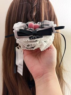 Black ribbon with cream, brown plaid pattern scrunchie/hair tie