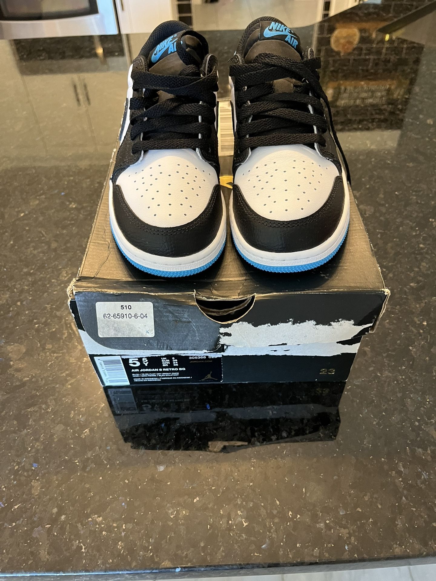 Air Jordan 1 Retro OG Low Unc