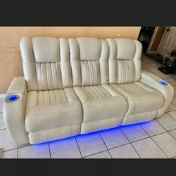 Like New 6 Months Old Leather Electric Dual Reclining Couch With Electric Headrests And Dual USB And Led Lighting 