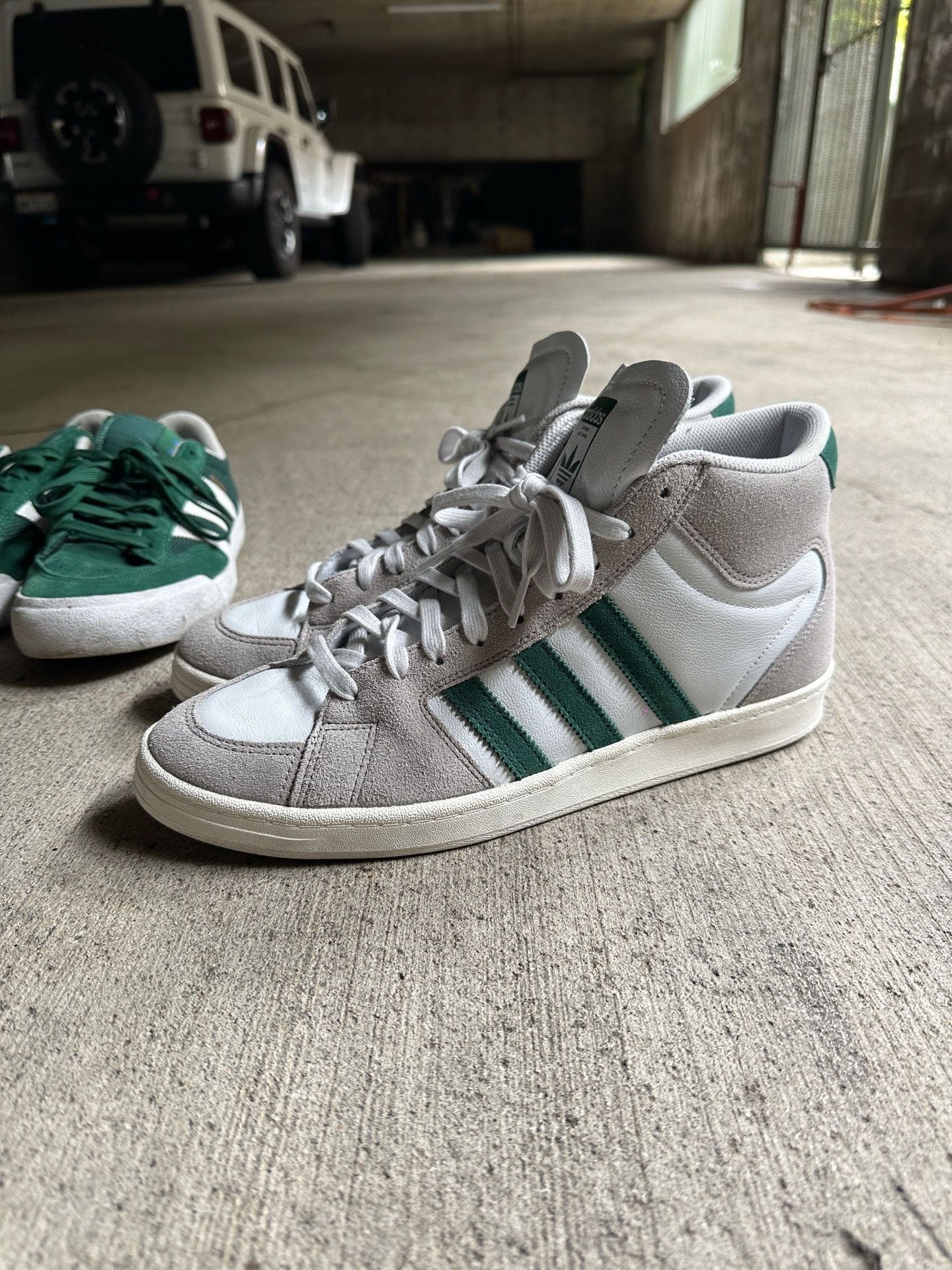 2 pairs of Adidas shoes