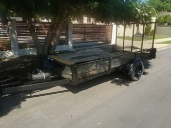 Utility trailer with ramp