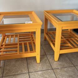 Set of two yellow end tables 