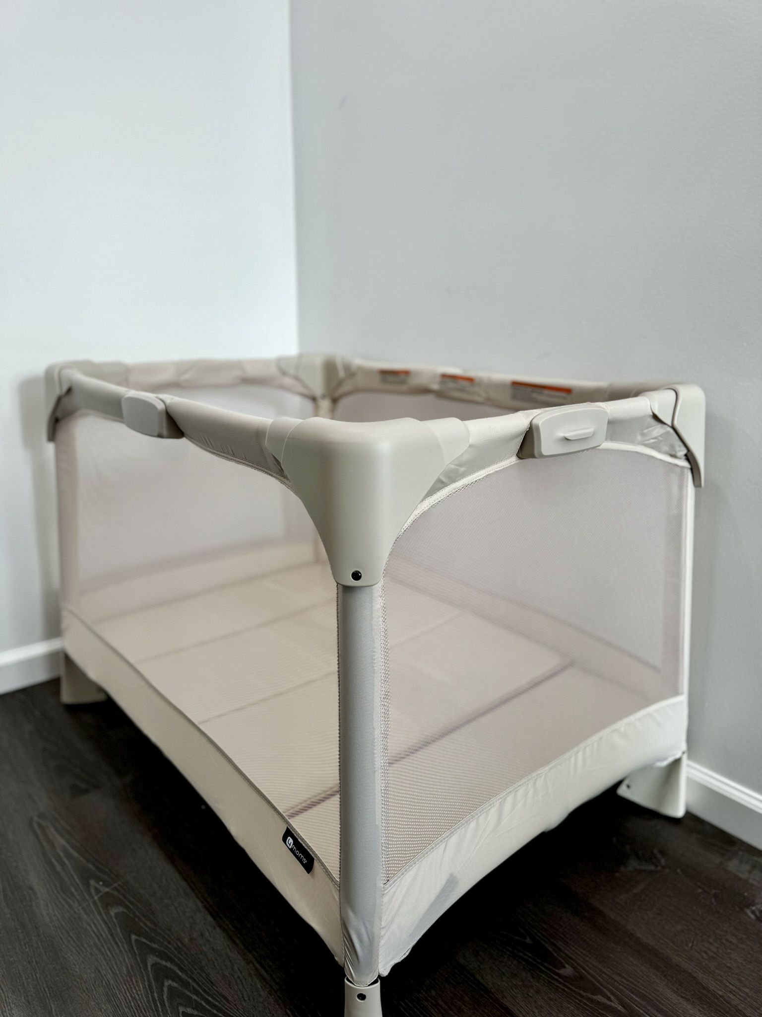 The 4moms® Breeze® Plus baby playard with bassinet and changer