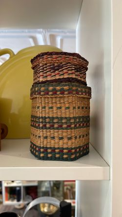 Pair of Mini baskets with lids.
