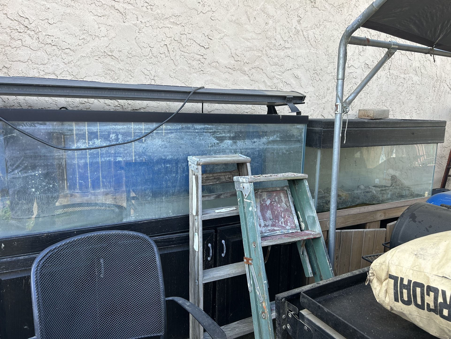 I Have To Large Fish Tanks W 80 Pounds Of Rock Asking 300 For Everything stands Are Included