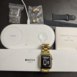 Apple Watch Series 3 w/ 3 Cases, Charging Pad, and Original Accessories