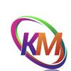 K M