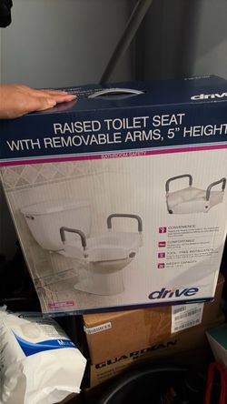 Raised toilet seat/ drive