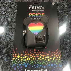 Loungefly nuiMOs Small pride collection Rainbow Backpack. Perfect for a change purse.  Brand new on original packaging .  Size 3 3/4 inches long.  Smo