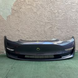 2017-2023  TESLA MODEL 3 FRONT BUMPER COVER W/ SENSOR HOLES OEM