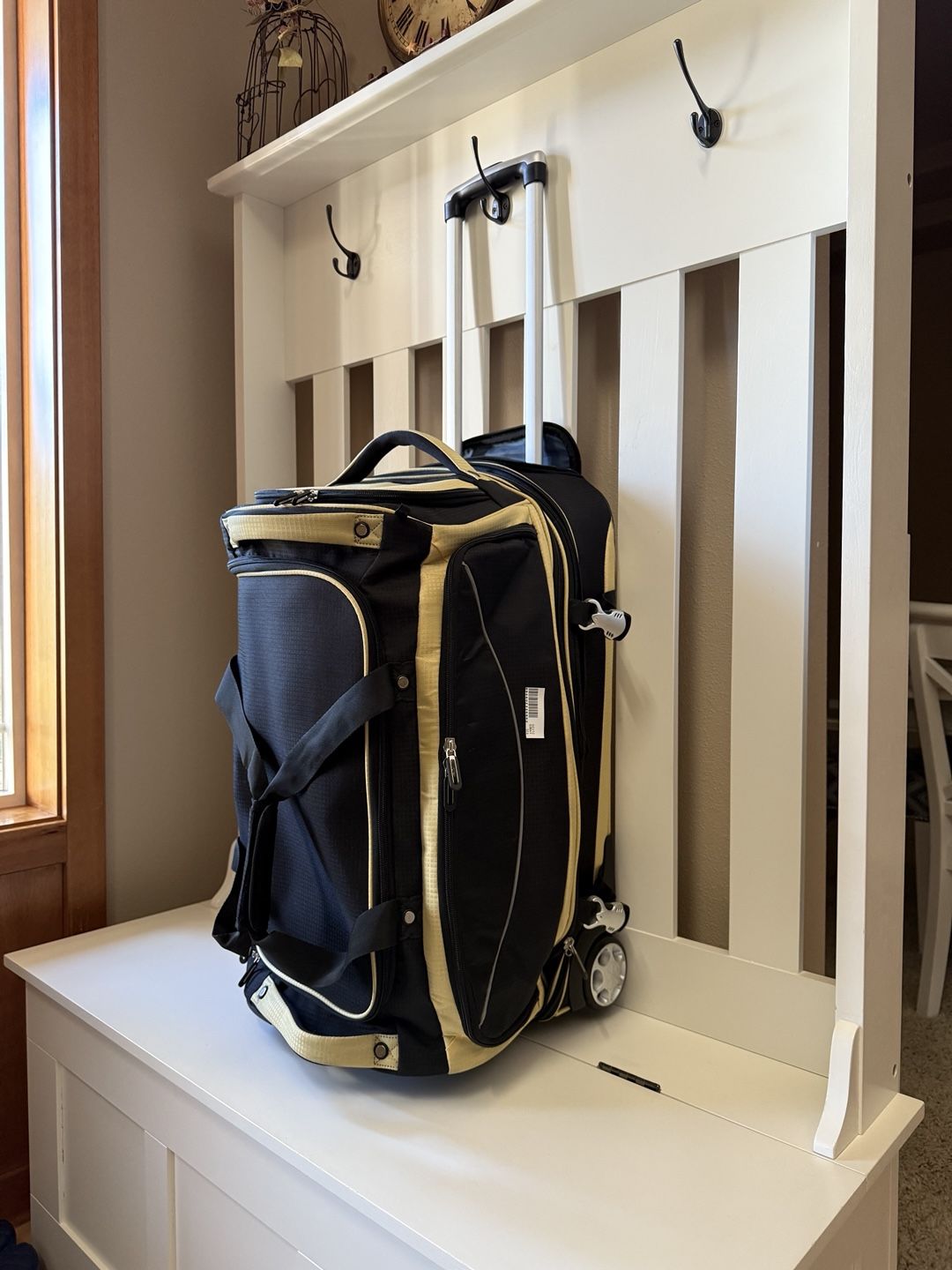 wheeled water proof luggage 25"Hx14"Wx13"D (expandable)