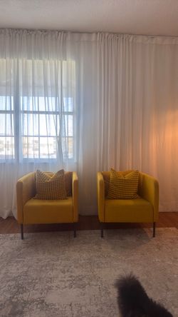 Two armchairs with cushions in excellent condition