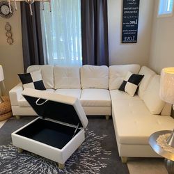 New White Leather Sectional Sofa With Storage Ottoman And Pillows 