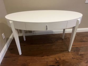 White oval desk