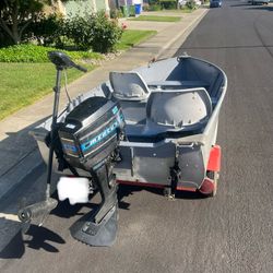 12 ft Klamath Boat and trailer With Motor 