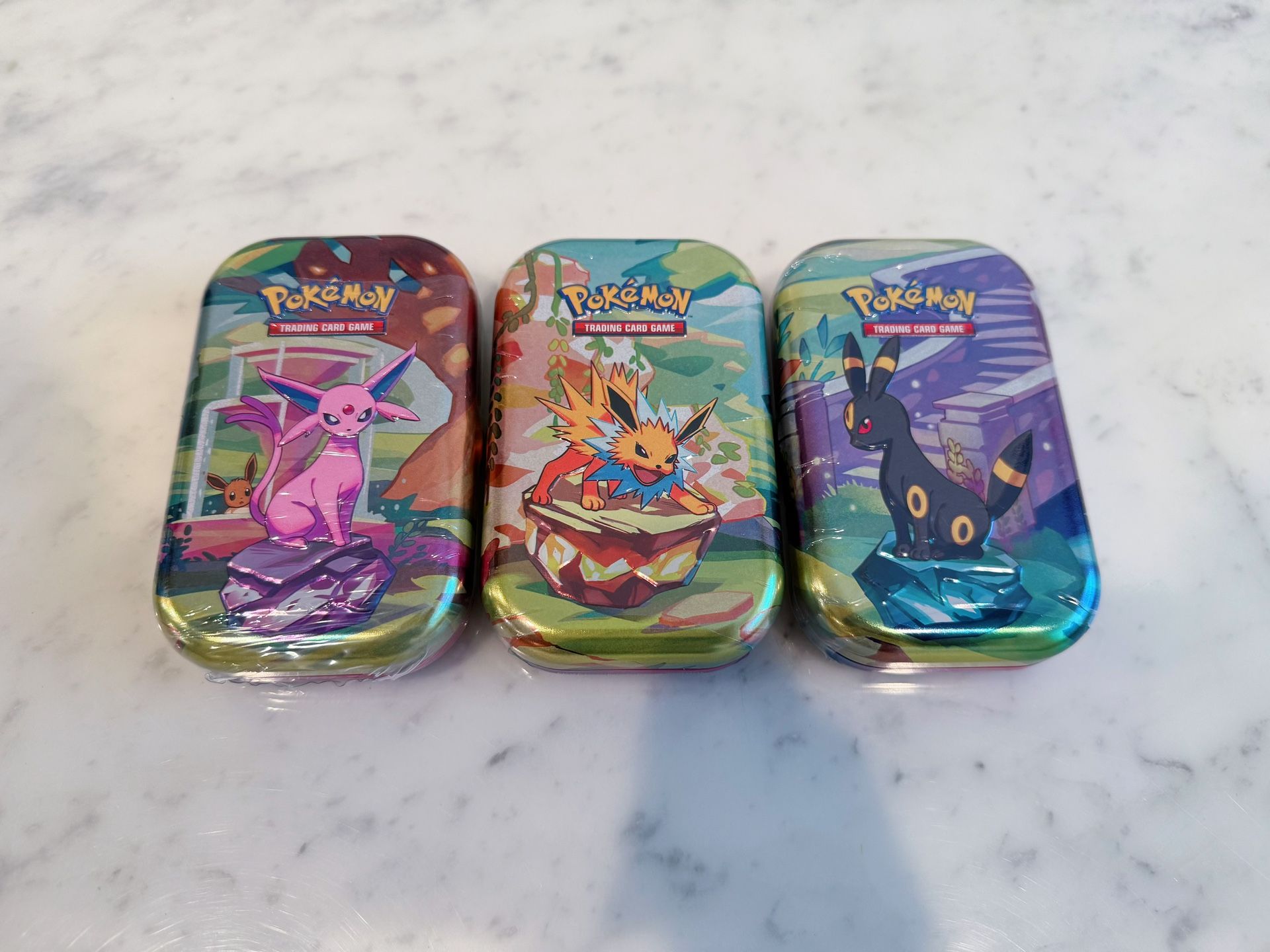 Sealed Pokemon Scarlet & Violet Prismatic Evolutions Expansion Mini Tins Umbreon Espeon Jolteon TCG Collection Trading Card Game Coin New Authentic