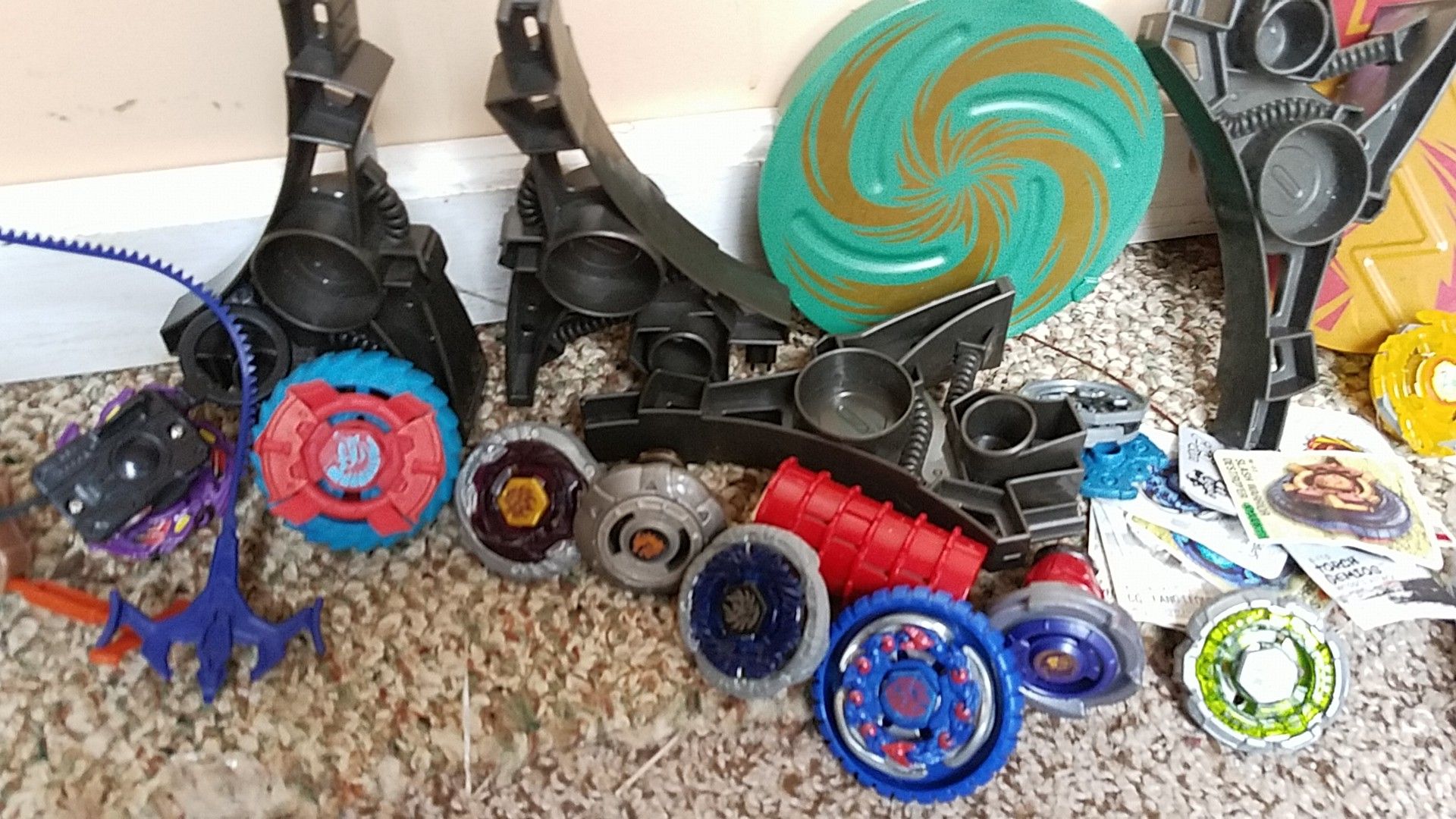Beyblades and arena sets